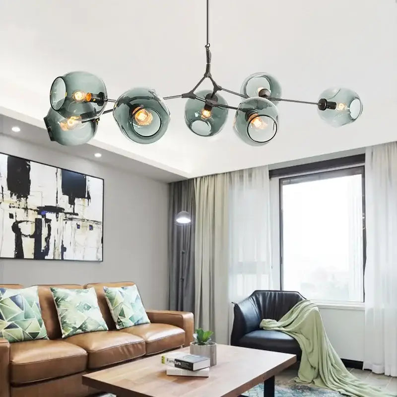 DecorBites™ contemporary glass bubble chandelier with teal glass globes and black metal arms for living room lighting