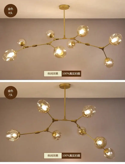 Gold-colored DecorBites™ contemporary glass bubble chandelier with eight frosted glass globe bulbs for living room