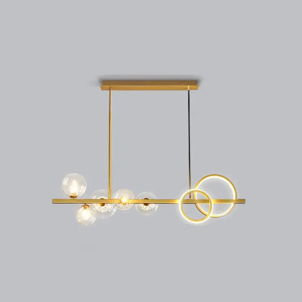 Decorbites contemporary gold-toned island lamp with clear glass globes and glowing led rings for dining room lighting