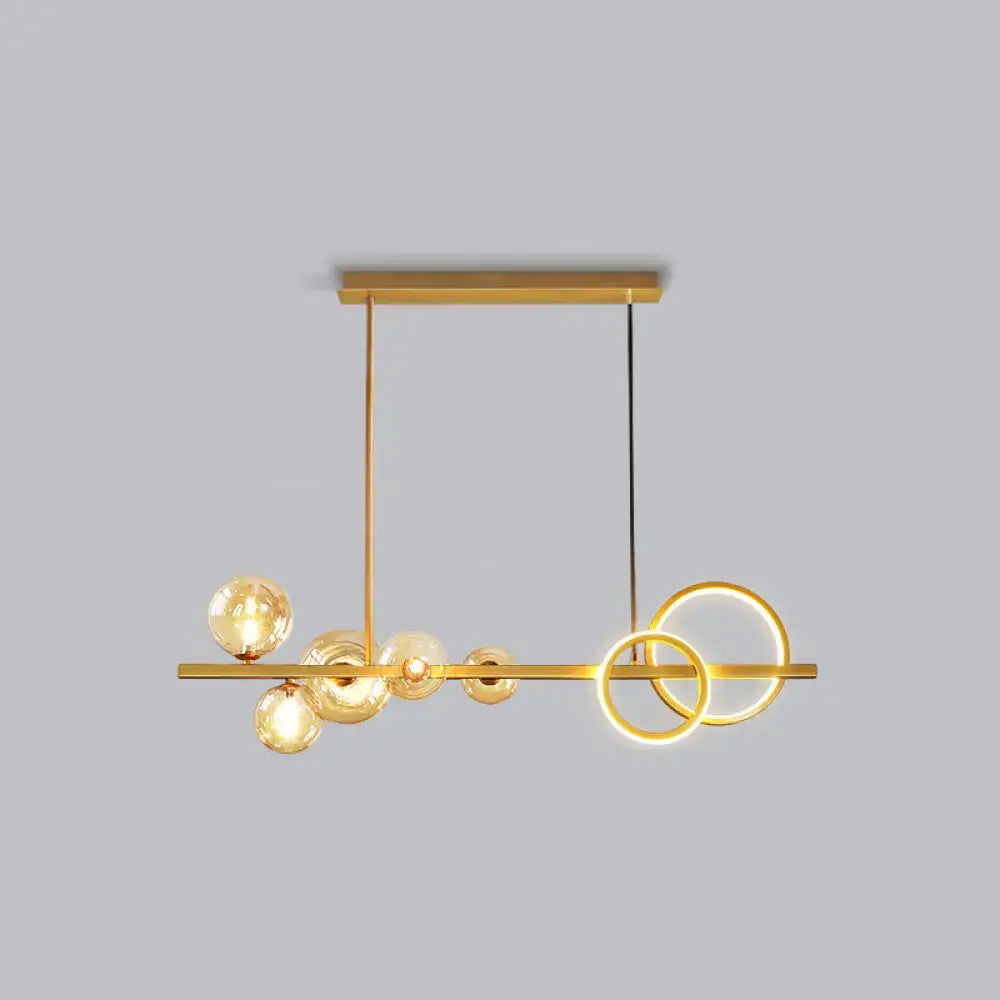 Decorbites™ contemporary 7-head island lamp with gold-toned bar, milk white glass bulbs, and smoke grey glowing rings