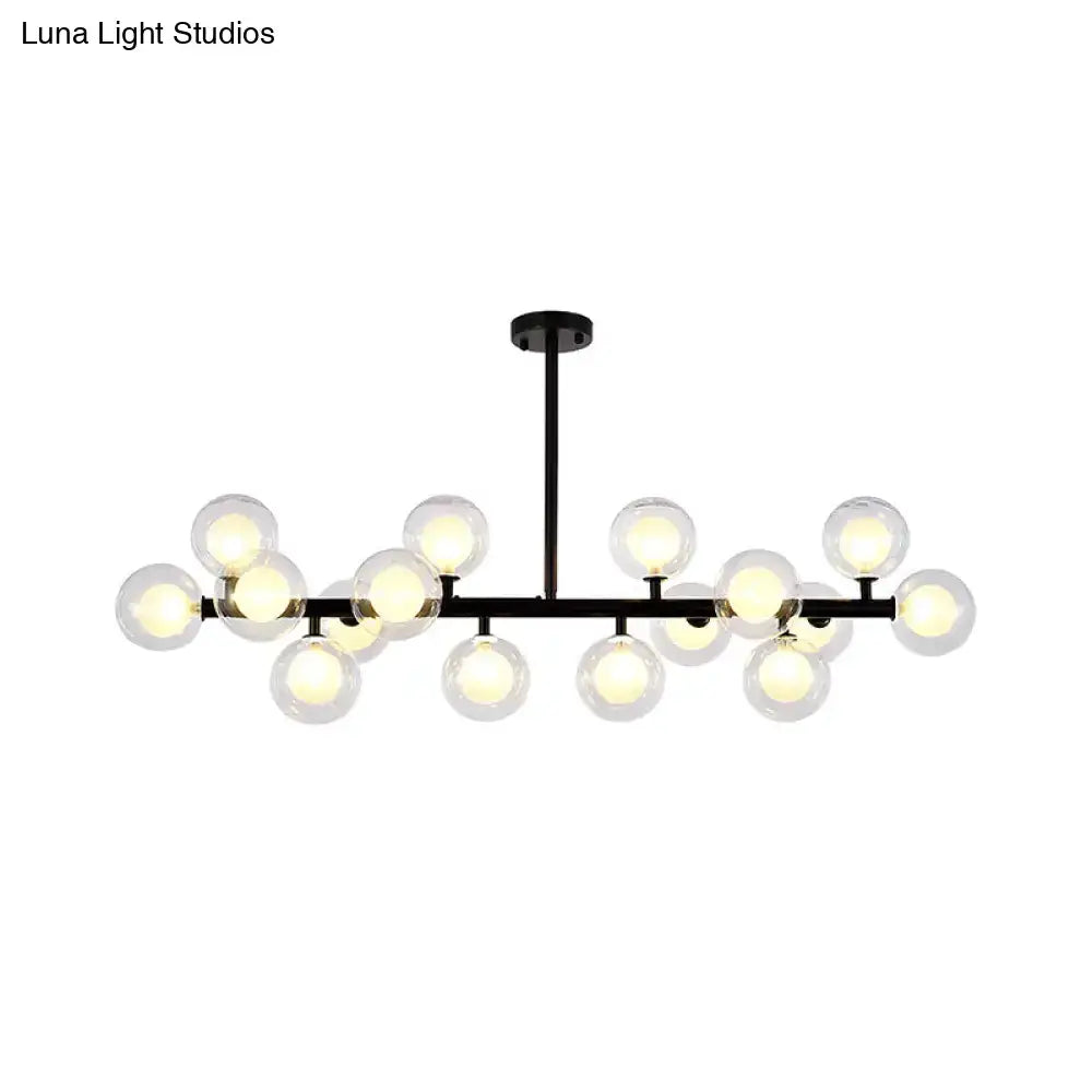 Black metal chandelier with multiple clear glass globe bulbs for living room by DecorBites contemporary glass orb lamp