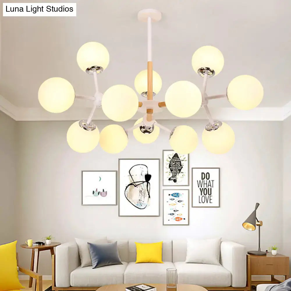Modern white and wood-toned decorbites chandelier with white glass globes for dining room hanging light kit