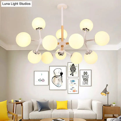Modern white and wood-toned decorbites chandelier with white glass globes for dining room hanging light kit