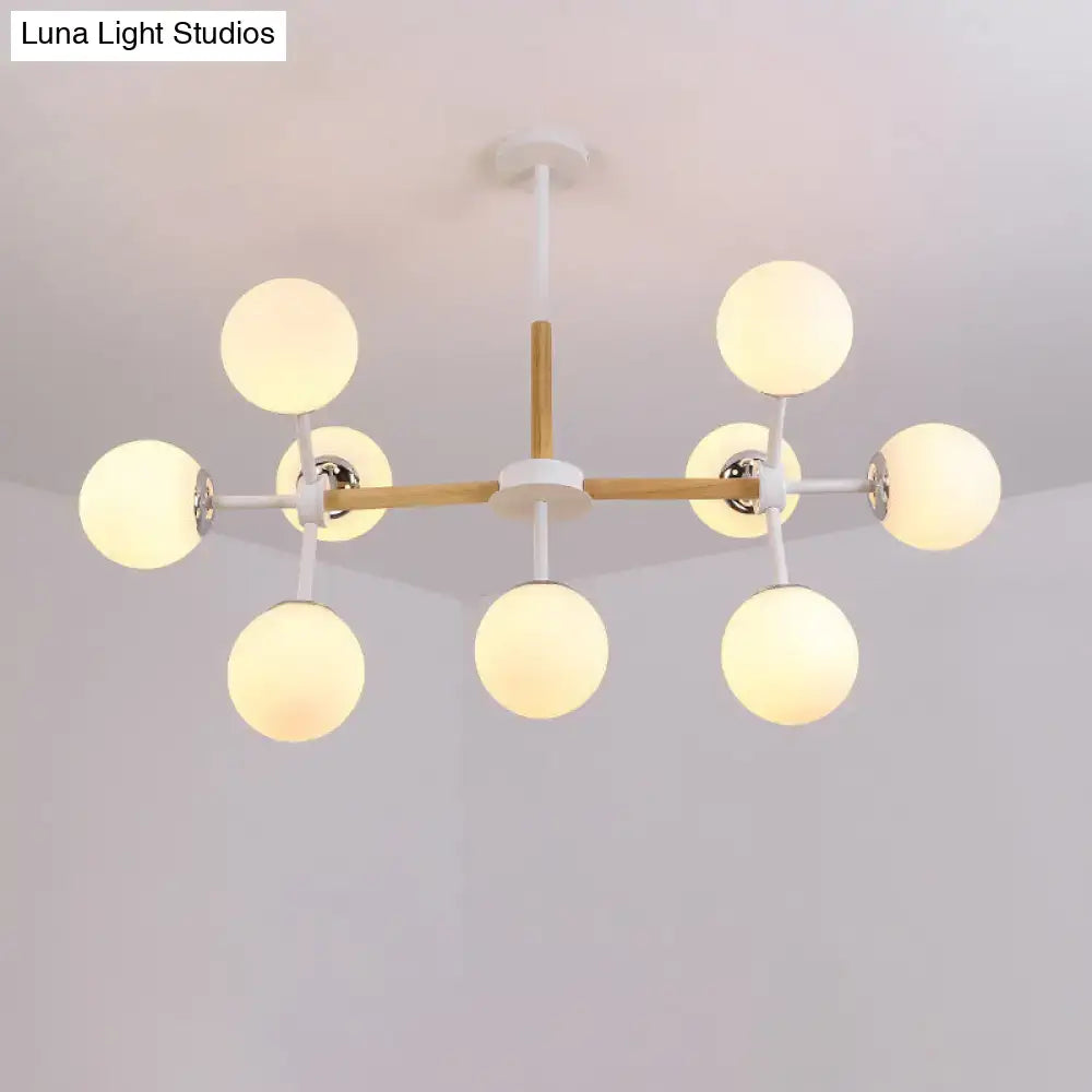Decorbites contemporary globe chandelier with white glass spheres and wood metal frame for dining room hanging light