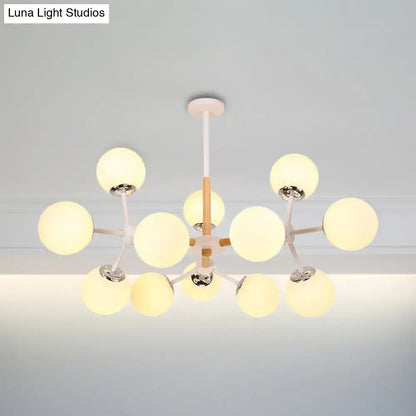 Modern DecorBites™ contemporary globe chandelier with white glass globes and wood-toned metal arms for dining room hanging light