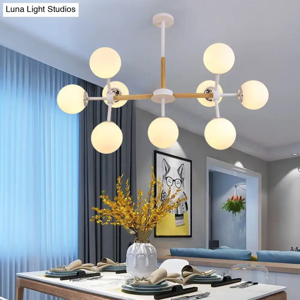 DecorBites™ contemporary globe chandelier with white glass globes and light wood arms for dining room hanging light