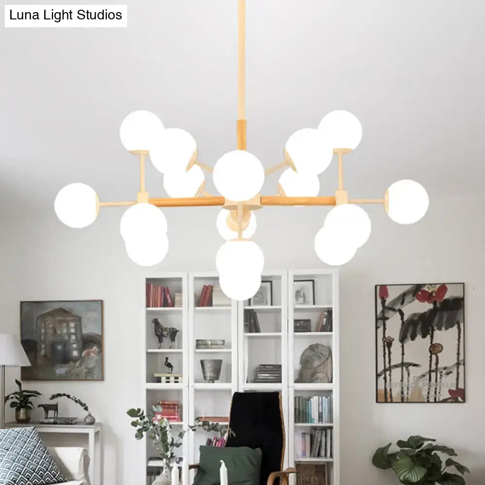 Modern decorbites™ chandelier with white glass globe shades and light wood frame for dining room hanging light