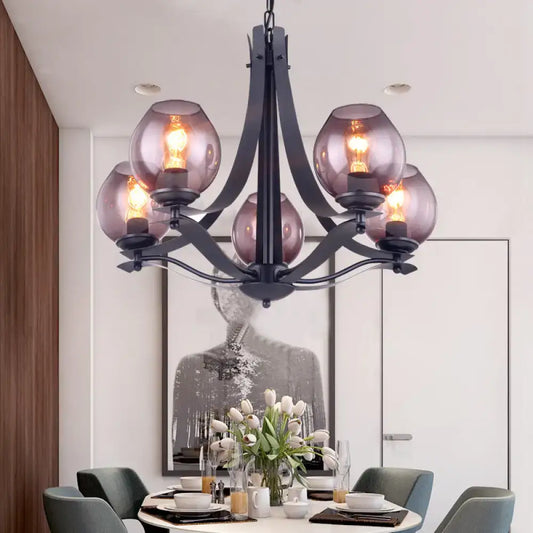 Black metal suspension pendant chandelier with five smoked globe gray glass shades for contemporary decor