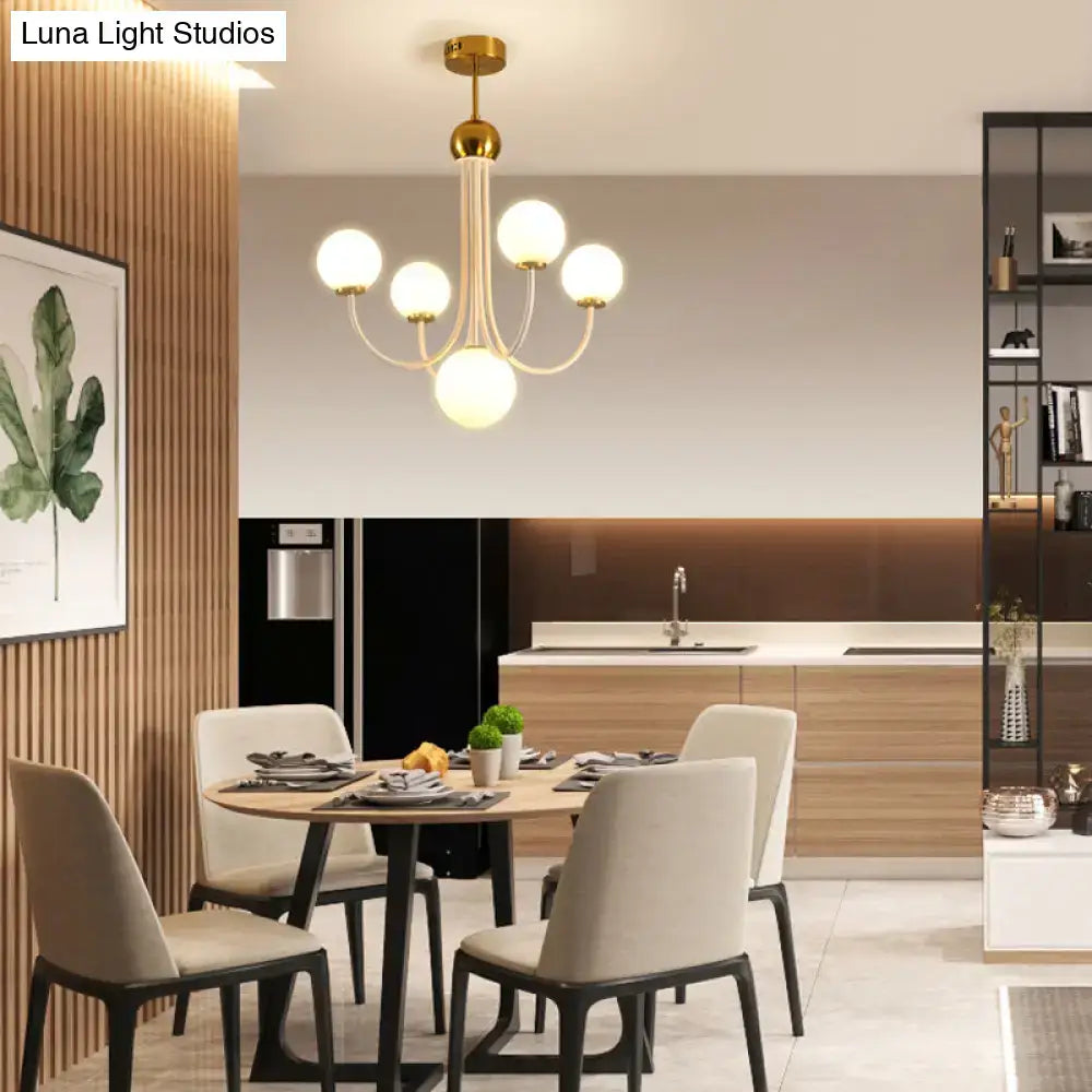 DecorBites™ contemporary gold glass spherical ceiling chandelier with five glass globes and central pendant lighting
