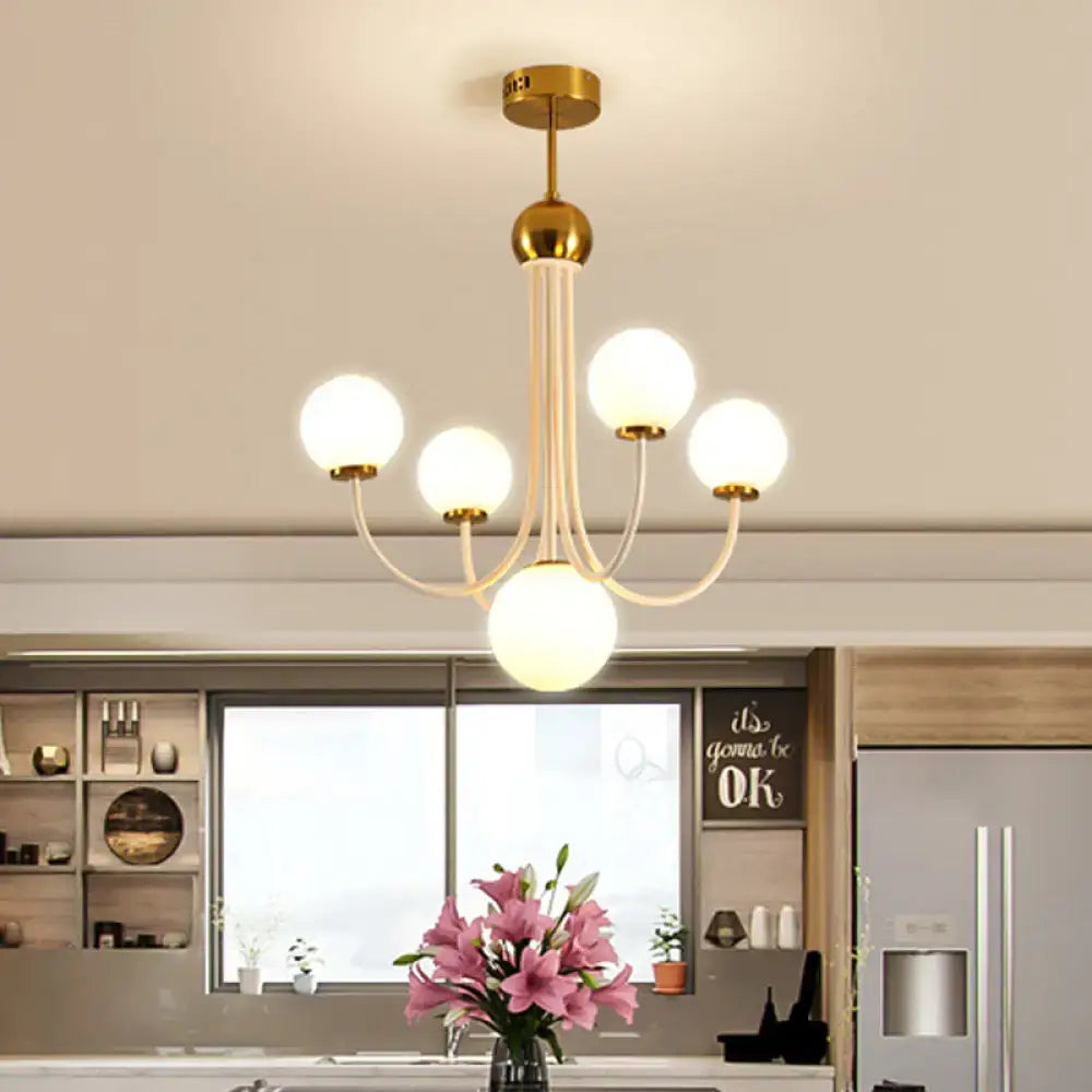 DecorBites™ contemporary gold glass spherical ceiling chandelier with five frosted glass globe lights and central pendant