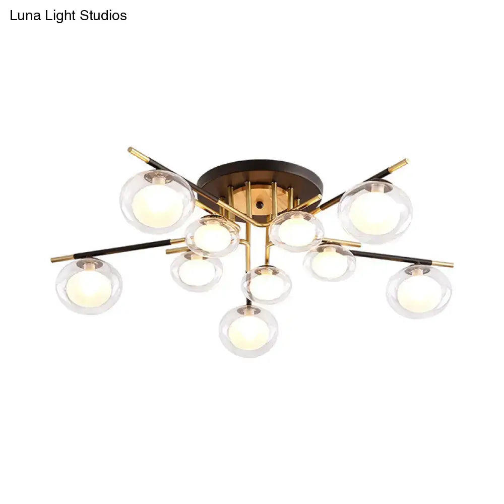DecorBites™ contemporary semi-flush mount ceiling fixture with brass base black and gold arms and clear oval shade globes