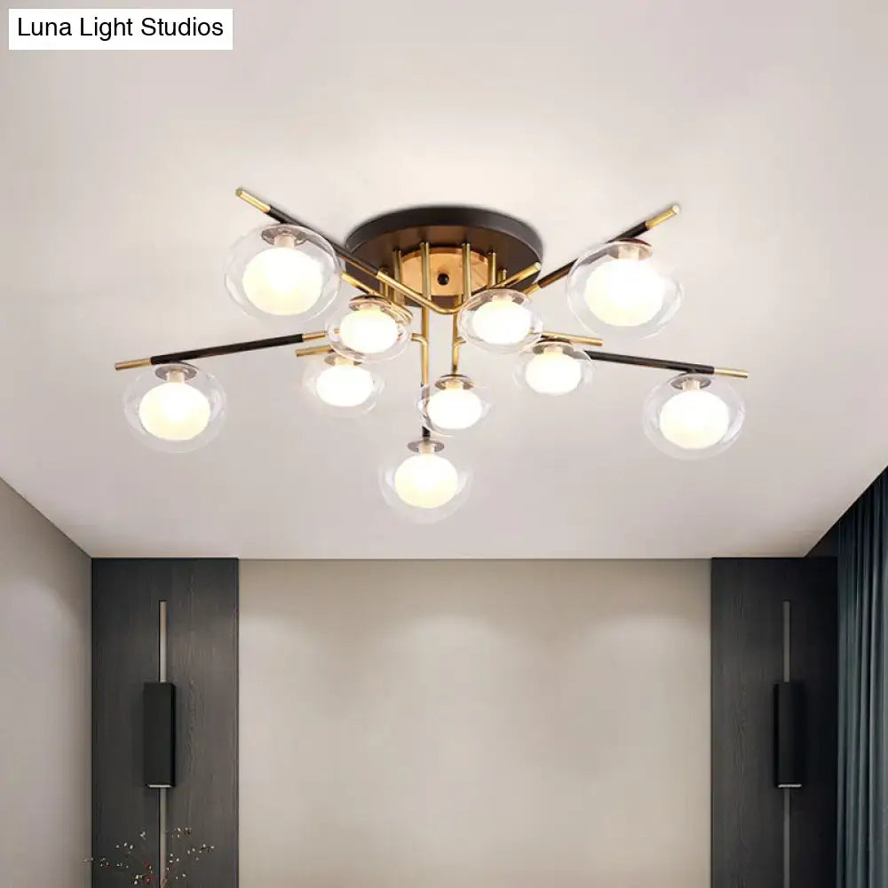 Decorbites™ semi-flush mount ceiling fixture with brass base, black arms, and clear glass oval shade bulbs for dining room