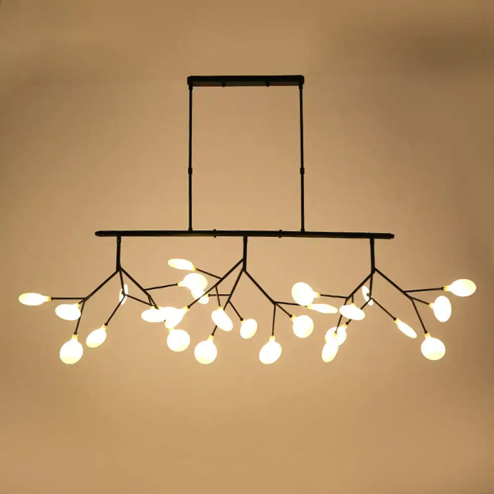 Black metal DecorBites™ heracleum island pendant light with branching arms and glowing spherical bulbs for dining rooms