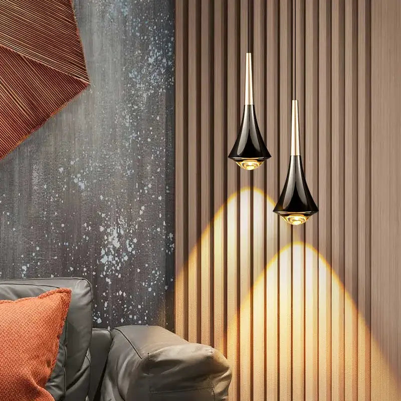 Two sleek black glass pendant lights with gold accents from decorbites contemporary horn chandelier for living rooms
