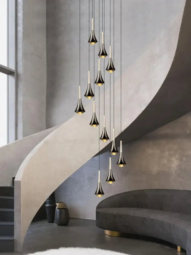 Black and gold decorbites contemporary horn chandelier with sleek teardrop glass fixtures for modern living room lighting