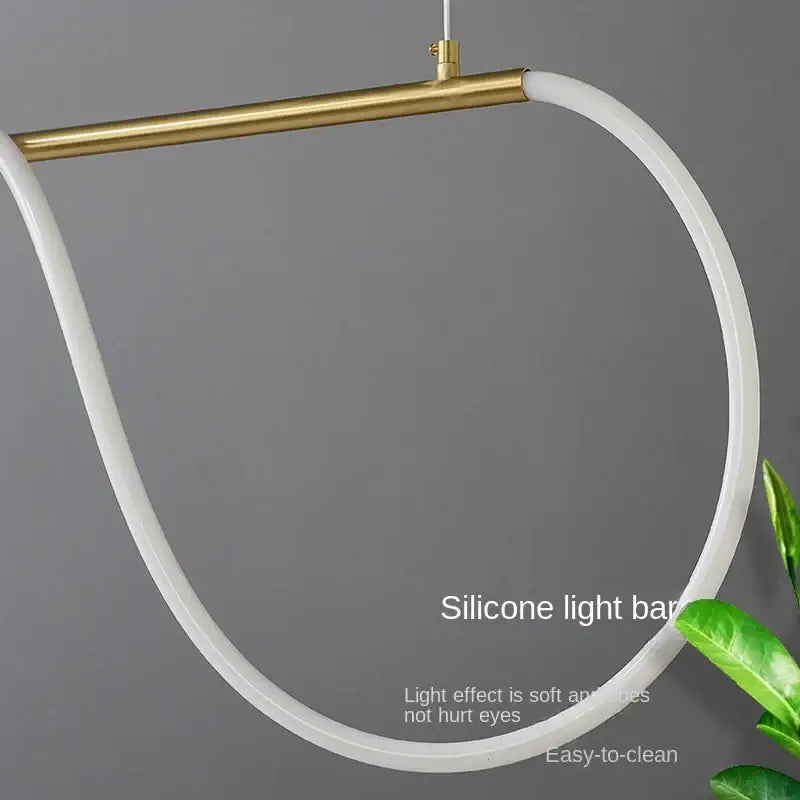 Modern minimalist decorbites™ contemporary led chandelier with white silicone ring and polished brass bar for dining room lighting