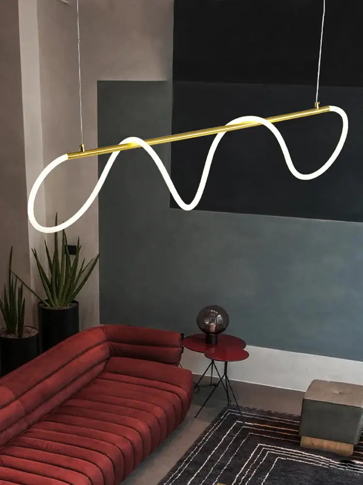 Gold-toned decorbites™ contemporary led chandelier with sleek serpentine white long hose led strip for dining room lighting