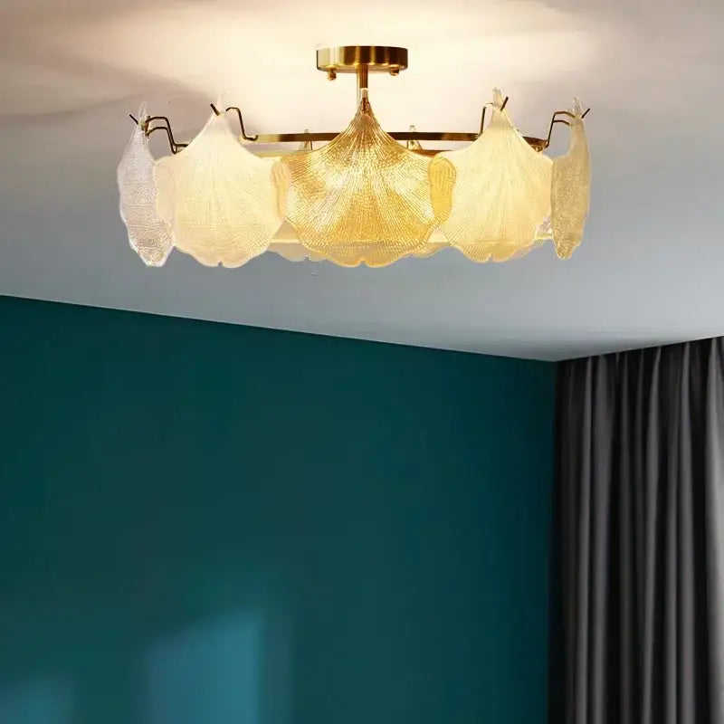 A decorbites contemporary led chandelier with gold metal frame and five amber white glass leaf shades for dining room