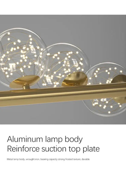 Modern brass-finished decorbites contemporary led glass ceiling chandelier with three clear glass spheres and string lights