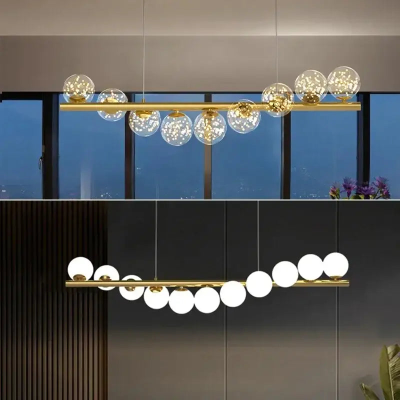 Gold-toned decorbites contemporary led glass ceiling chandelier with linear design and spherical glass globe shades in warm and opaque finishes