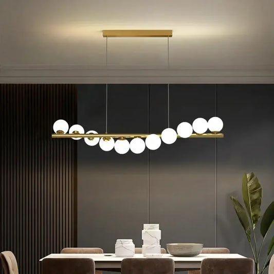 Gold-toned decorbites contemporary led glass ceiling chandelier with sleek horizontal bar and spherical bulbs for home lighting
