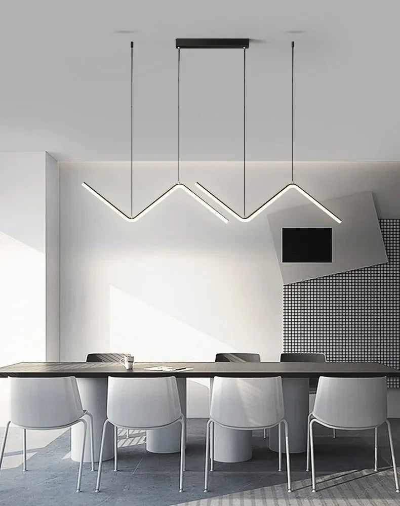 DecorBites™ contemporary black led pendant lights with angular zigzag design hanging above dining table