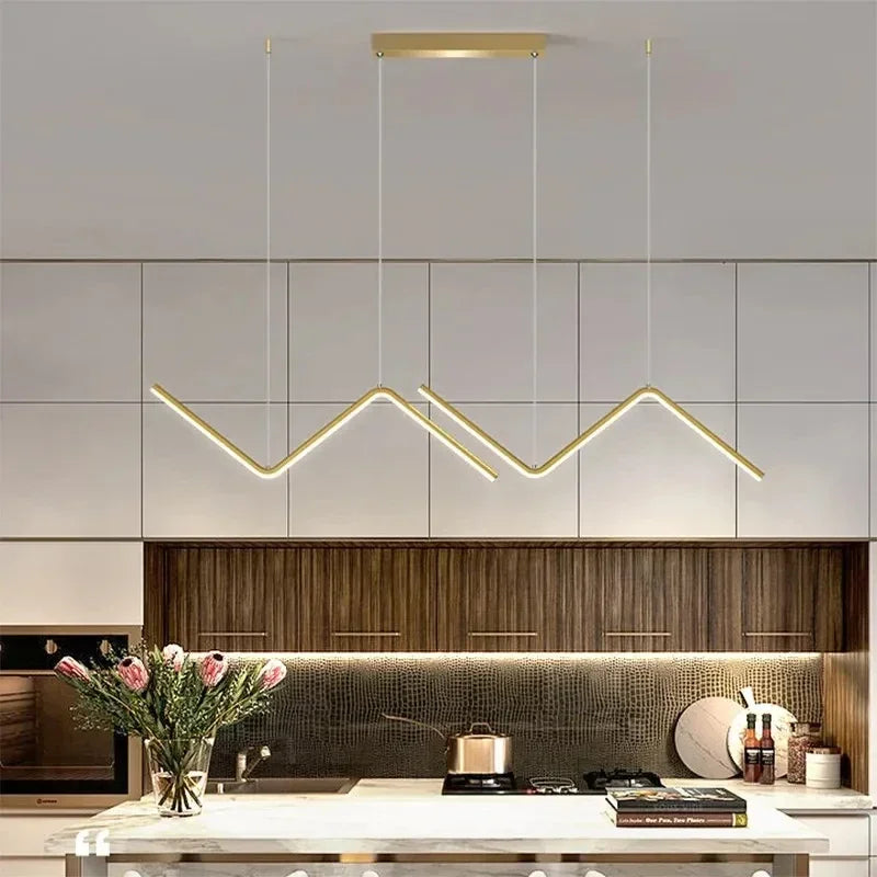 DecorBites™ contemporary gold-toned led pendant lights with sleek zigzag design suspended above kitchen counter