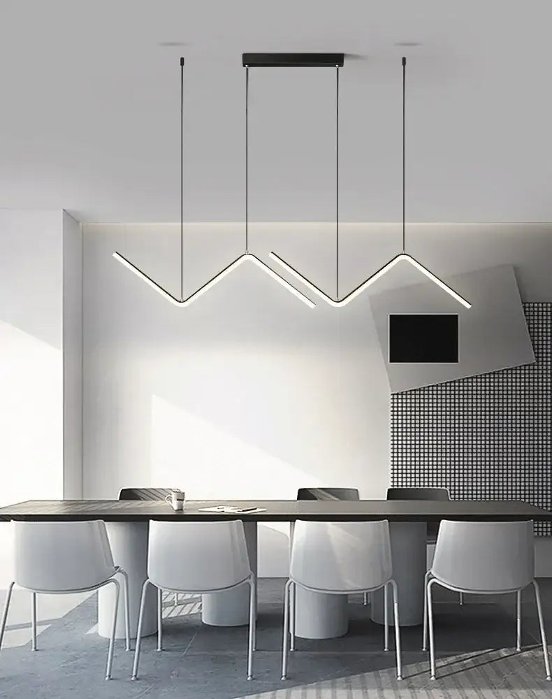 DecorBites™ contemporary black led pendant lights with angular zigzag design hanging above dining table
