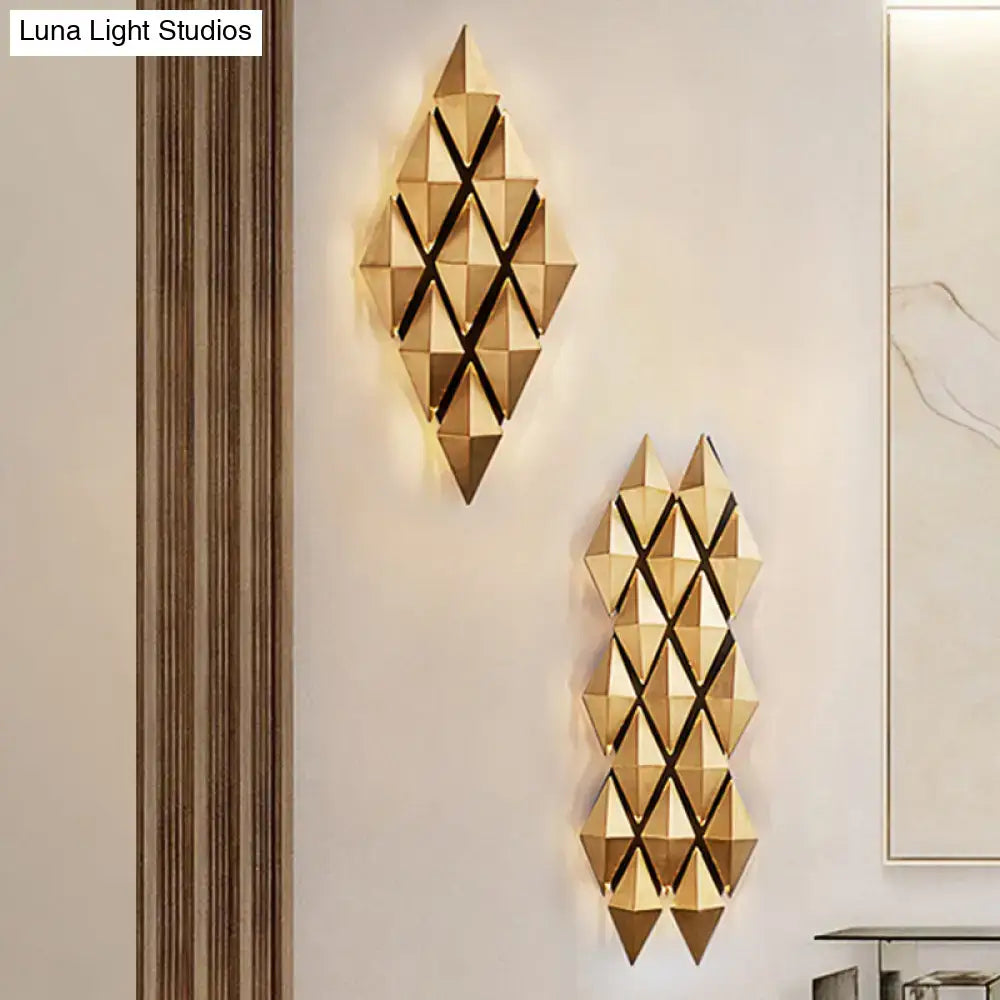 Modern gold diamond led wall lamp with geometric faceted design and black accent lines as a bedroom light fixture