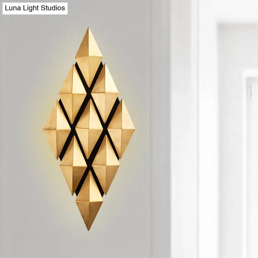 Modern gold diamond led wall lamp featuring a geometric design with interlocking triangular facets and black accents