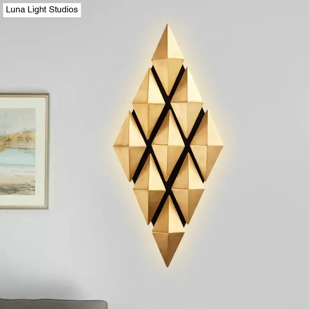 Modern gold diamond wall lamp with geometric triangular facets and black intersecting bars light fixture for bedroom
