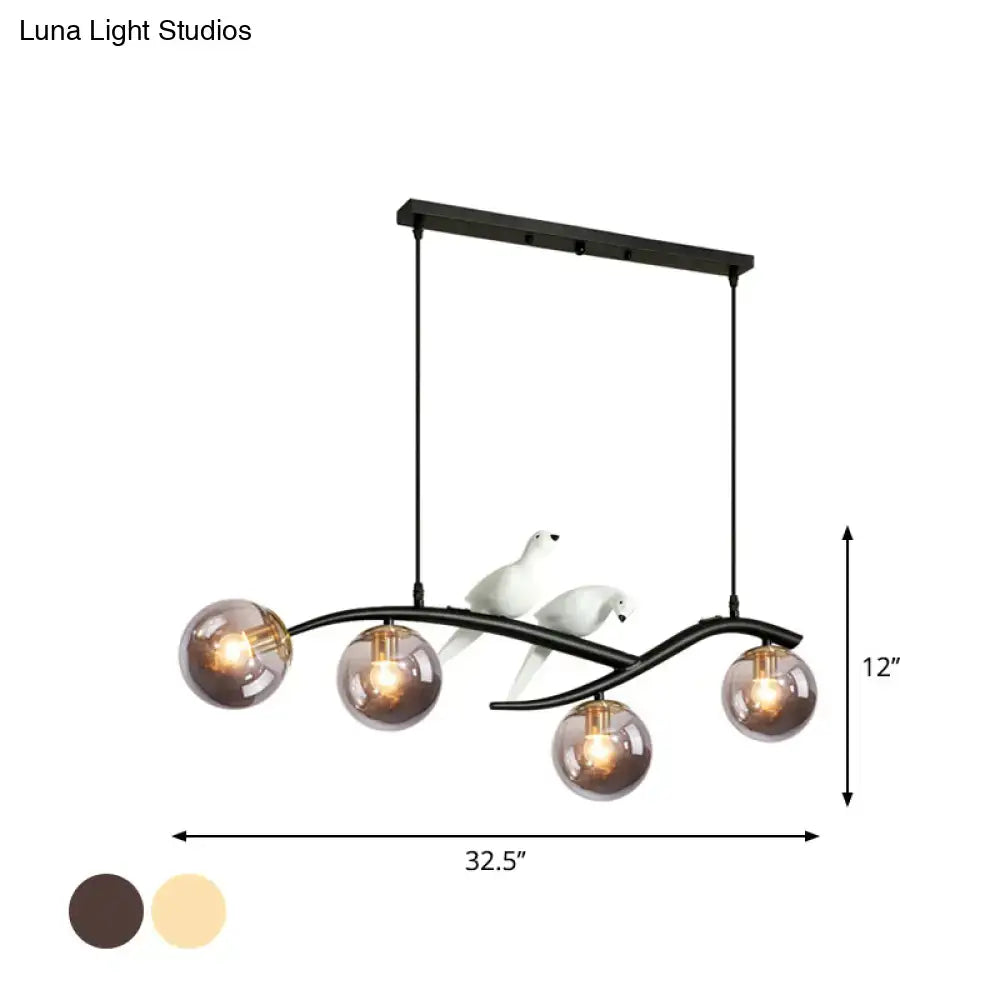 DecorBites contemporary black metal chandelier with four smoke grey cognac glass globes and white bird figurines