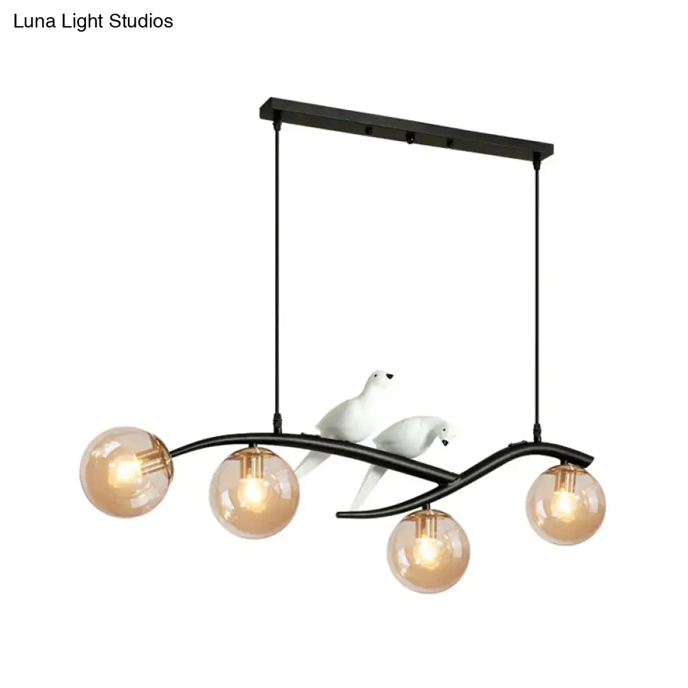 DecorBites contemporary black metal branch hanging lamp with four amber globes and white ceramic doves smoke grey cognac