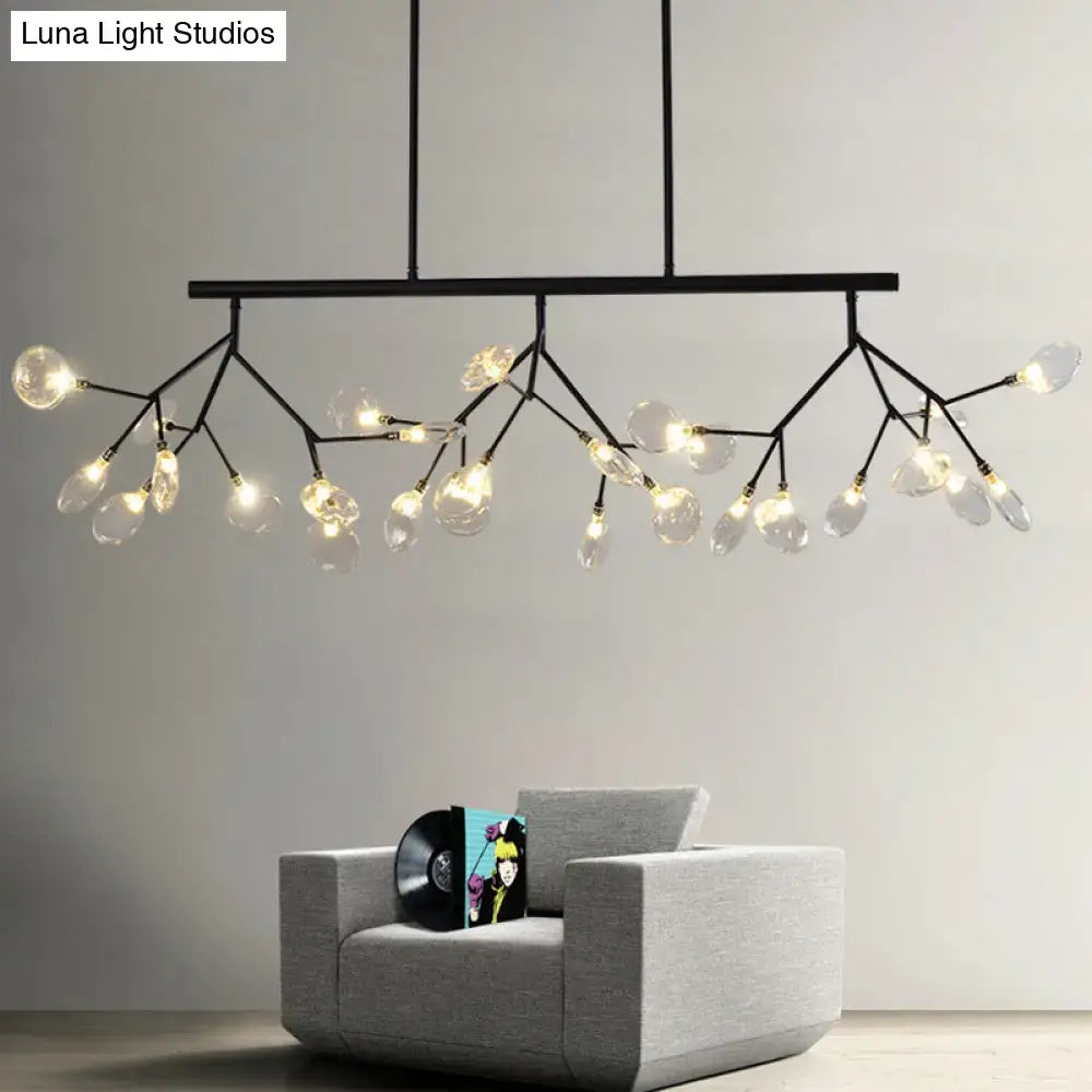 Black metal pendant chandelier with branching arms and clear glass shade bulbs featuring a round canopy