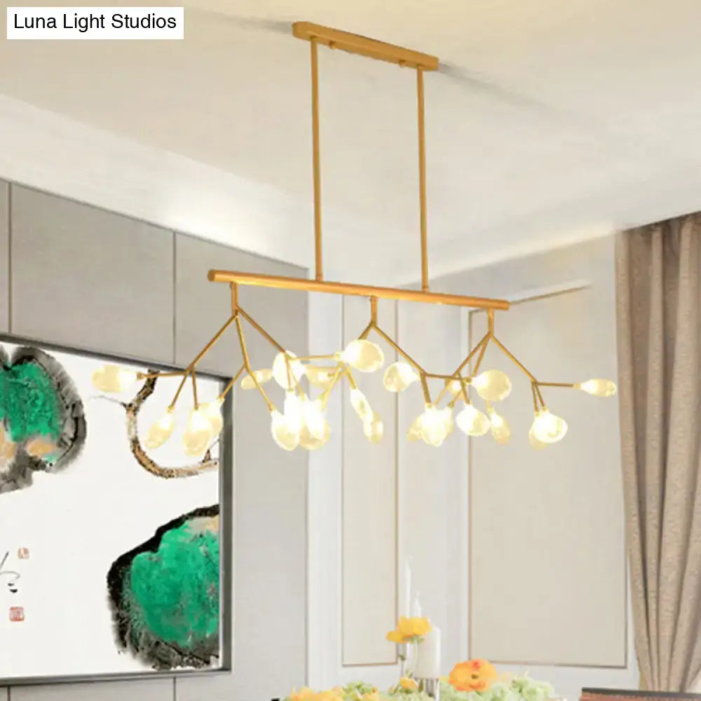 Gold-toned DecorBites™ metal pendant with clear glass shade and round canopy featuring delicate branching arms