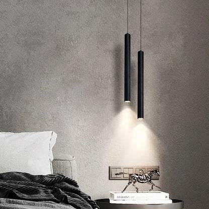 Two sleek black DecorBites™ contemporary nordic led pendant lights cast a warm glow for dining room use