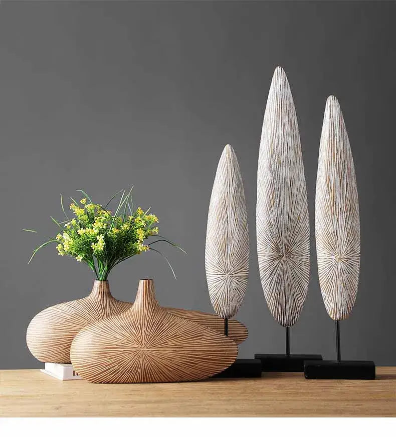 Set of three contemporary resin vases with wooden radial grain patterns and black stands for flower arrangements