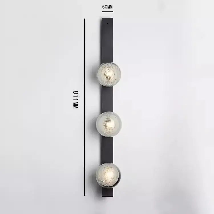 Black metal wall light with three frosted glass globes by DecorBites™ contemporary wall light for modern spaces