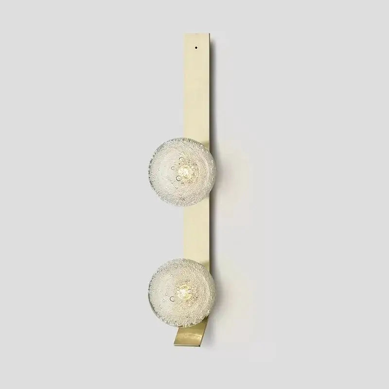 Gold-toned decorbites™ contemporary wall light with two textured frosted glass globe shades for elegant lighting