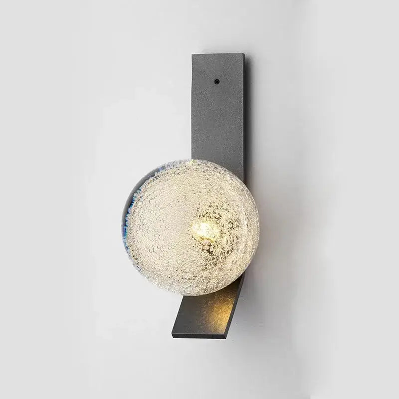 DecorBites™ contemporary wall light with textured frosted glass globe in blue and white hues on matte black brackets