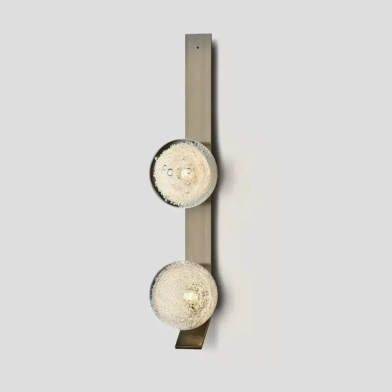 DecorBites™ contemporary wall light with two frosted glass orbs on a brushed metal vertical bar wall sconce