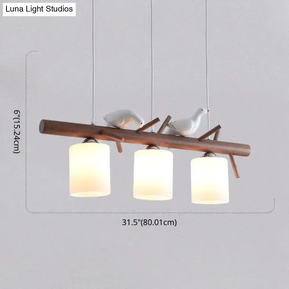 Wooden branch pendant light with two white ceramic birds and frosted cylindrical glass shades compatible with e26 e27 bulbs