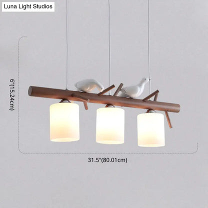 Wooden branch pendant light with two white ceramic birds and frosted cylindrical glass shades compatible with e26 e27 bulbs