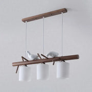 DecorBites contemporary wood island pendant with nutcracker design features cylindrical glass shades and e26 e27 bulbs