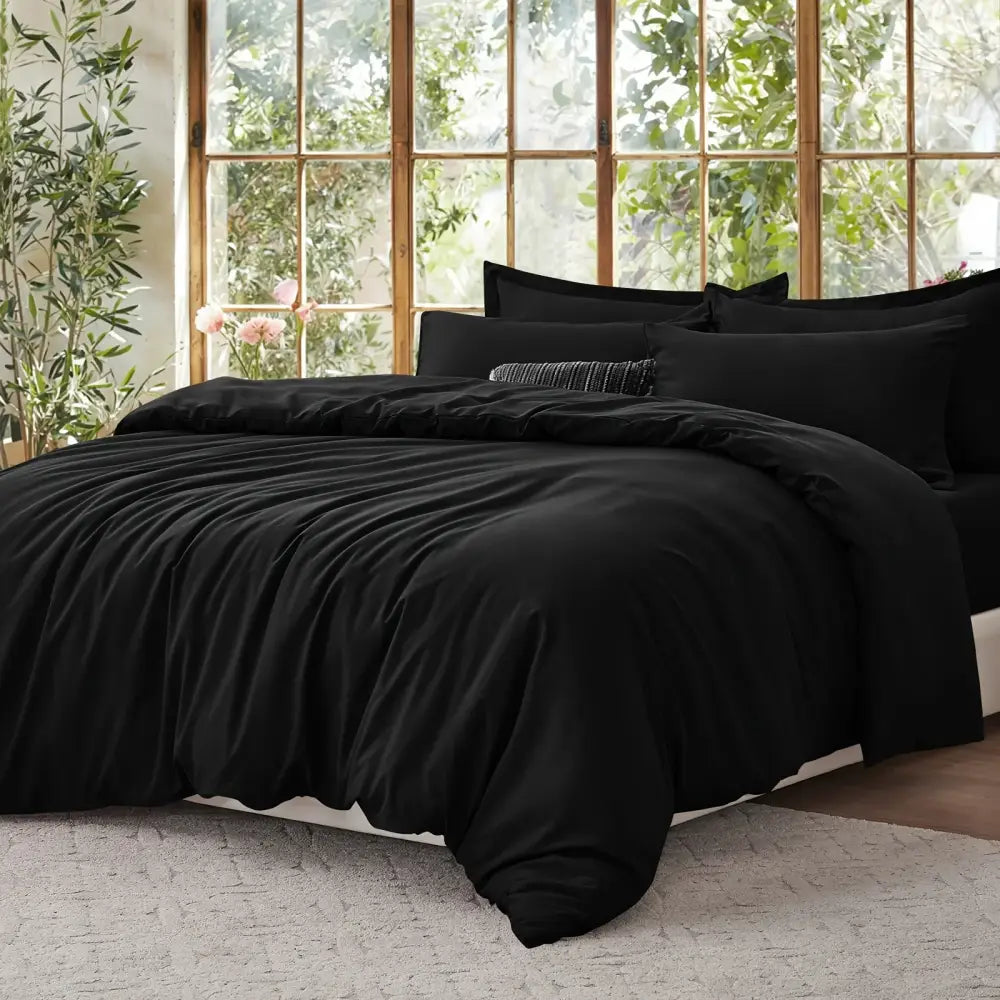 Black cotton duvet cover set with subtle vertical pleats and soft smooth texture from decorbites cooling summer collection