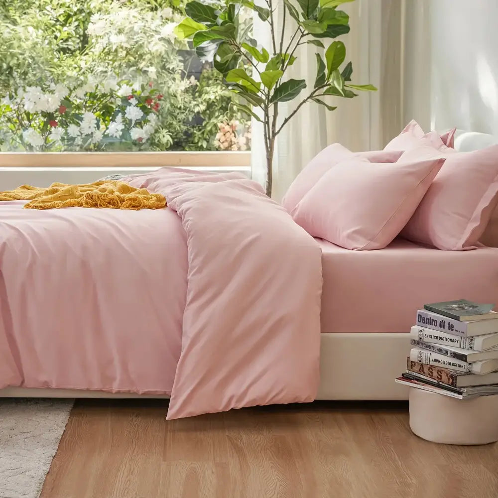 Pink satin decorbites™ cooling summer cotton duvet cover set with matching pillows and soft yellow throw blanket