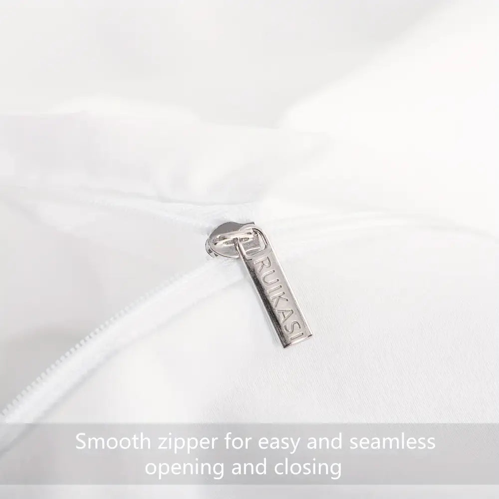 Silver metal zipper pull engraved rukasi on white cotton fabric of decorbites cooling summer cotton duvet cover set