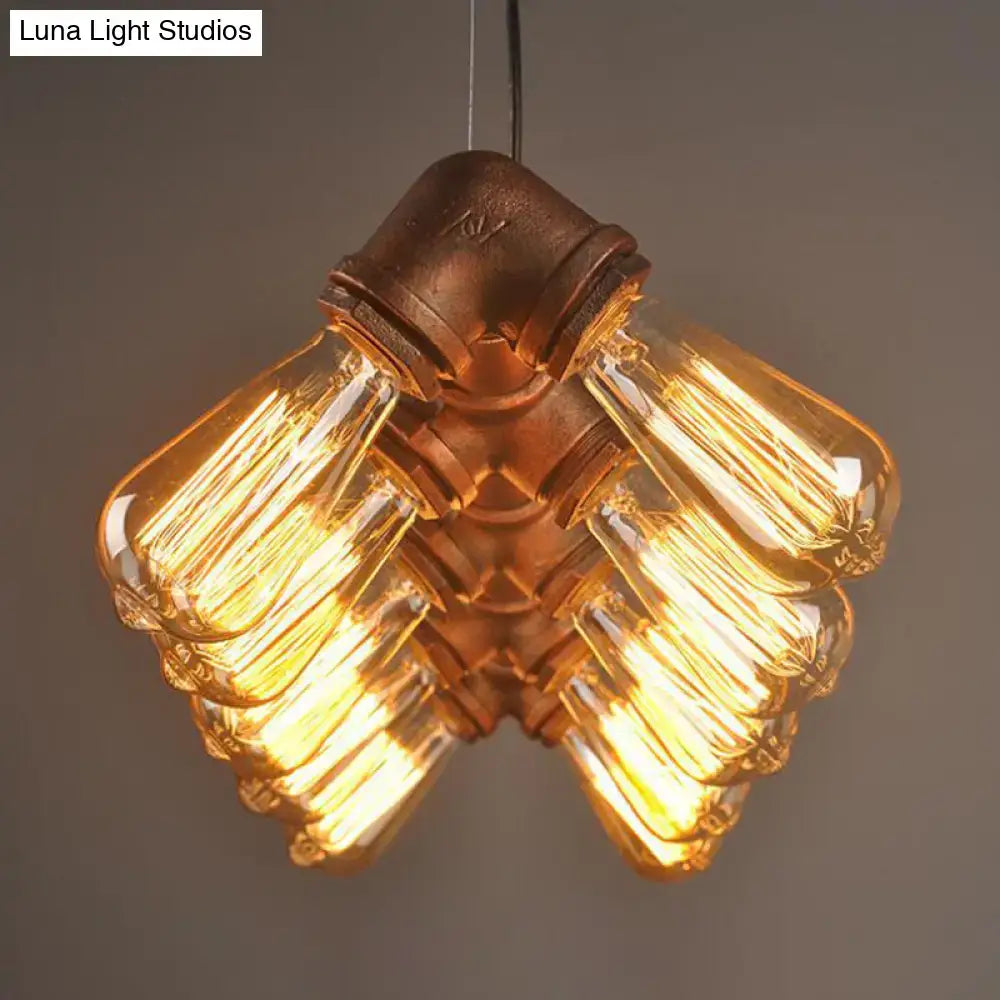 DecorBites copper and black industrial kitchen island pendant light fixture with symmetric piping and 10 amber bulbs