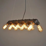DecorBites™ black copper industrial kitchen island pendant light fixture with symmetric piping and 10 glowing bulbs