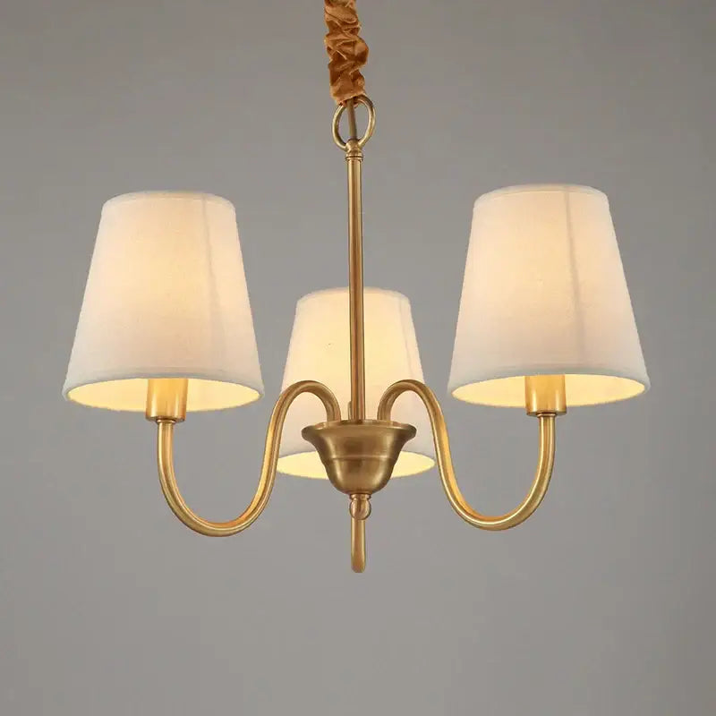 Brass-finished three-light decorbites copper ceiling chandelier with cream fabric shades for living room lighting
